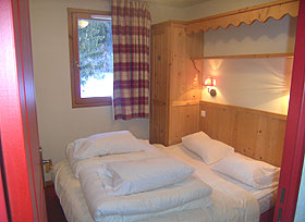 Schlafzimmer in der Residenz Les Alpages